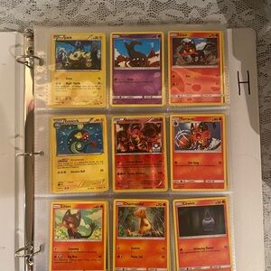 (H) Collection of Pokémon Cards in binder with over 100 Cards
